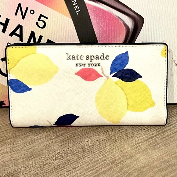 Kate Spade White Wallet with Yellow and Blue Accents - Picture 1 of 5